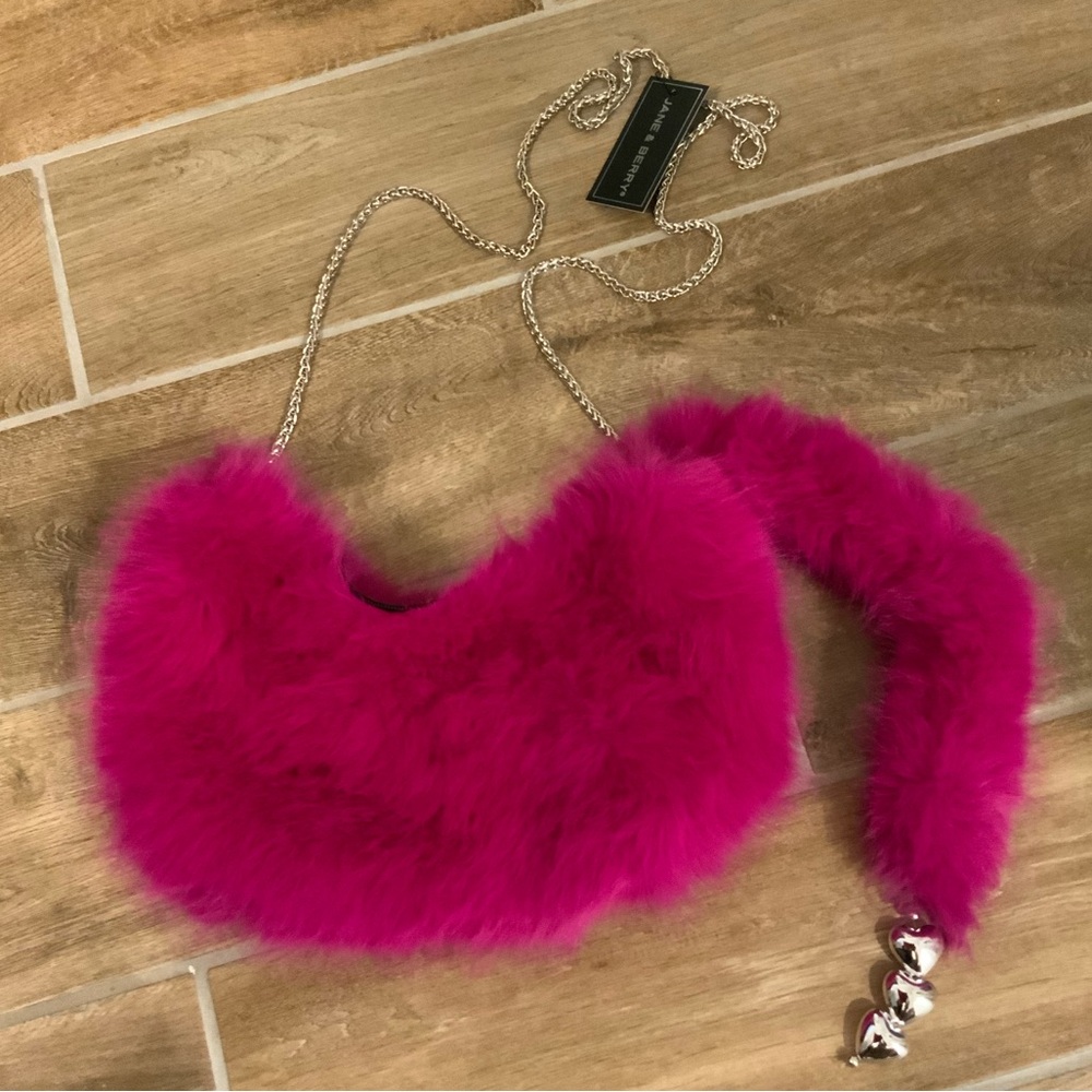 Run! This purse will sell quick! Faux fur, hot pink, removable crossbody chain!